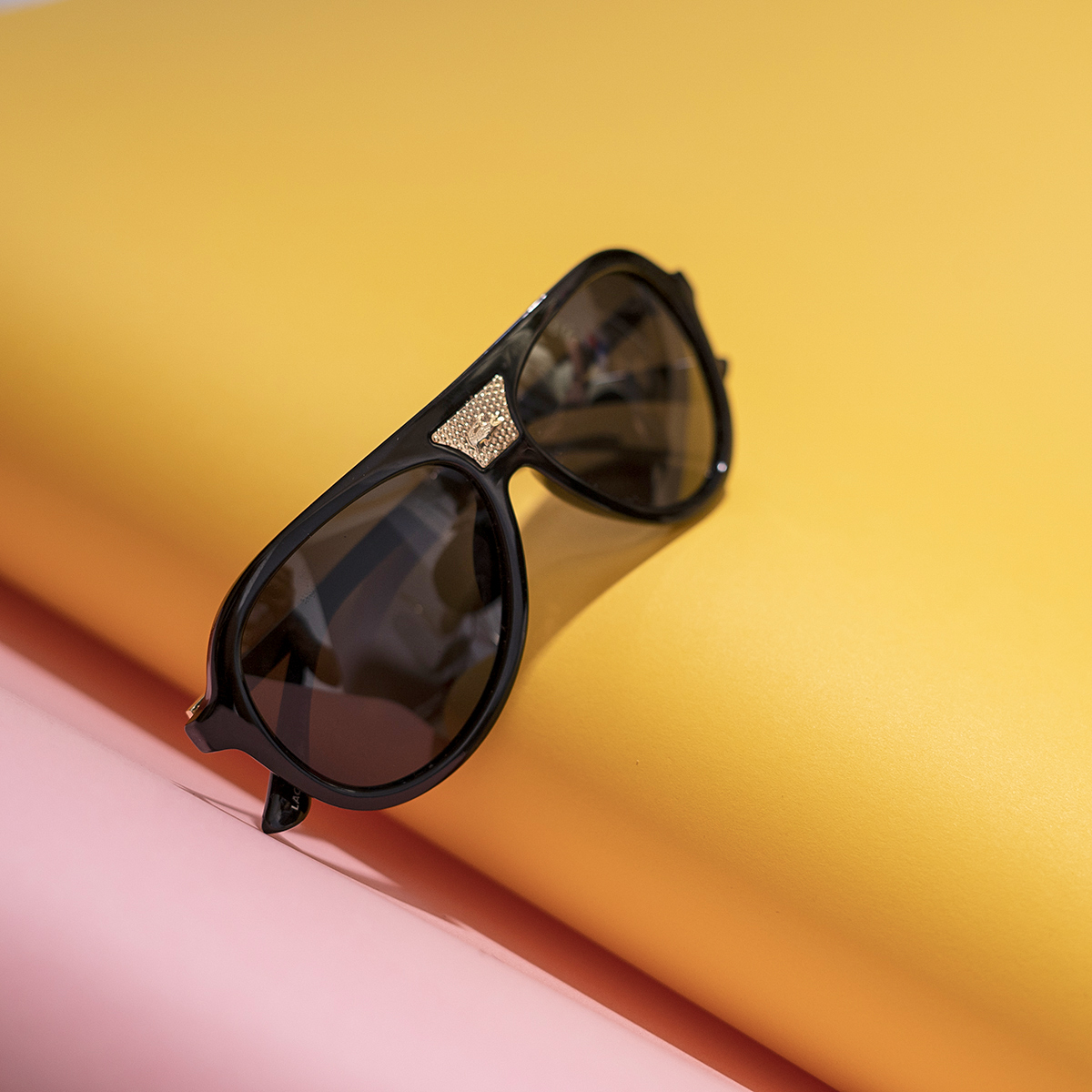 عينك آفتابي LACOSTE مشكي براق