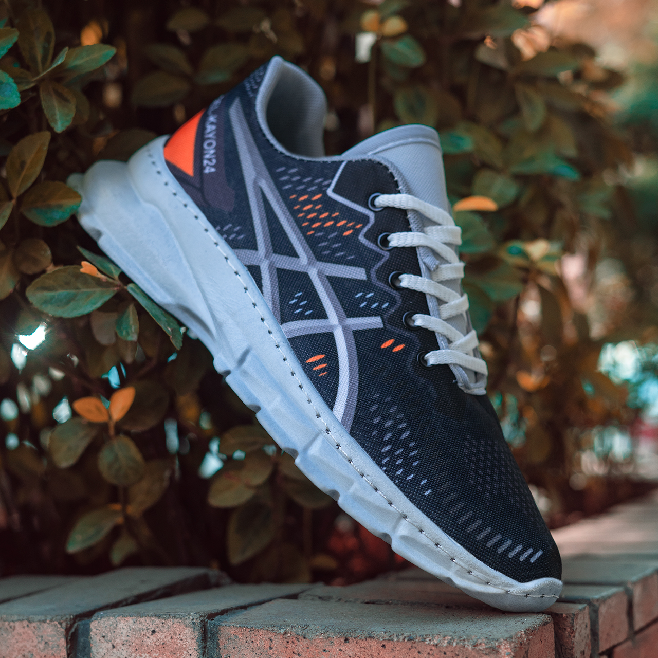 کفش مردانه اسیکس سرمه ای نارنجی مدل dahak