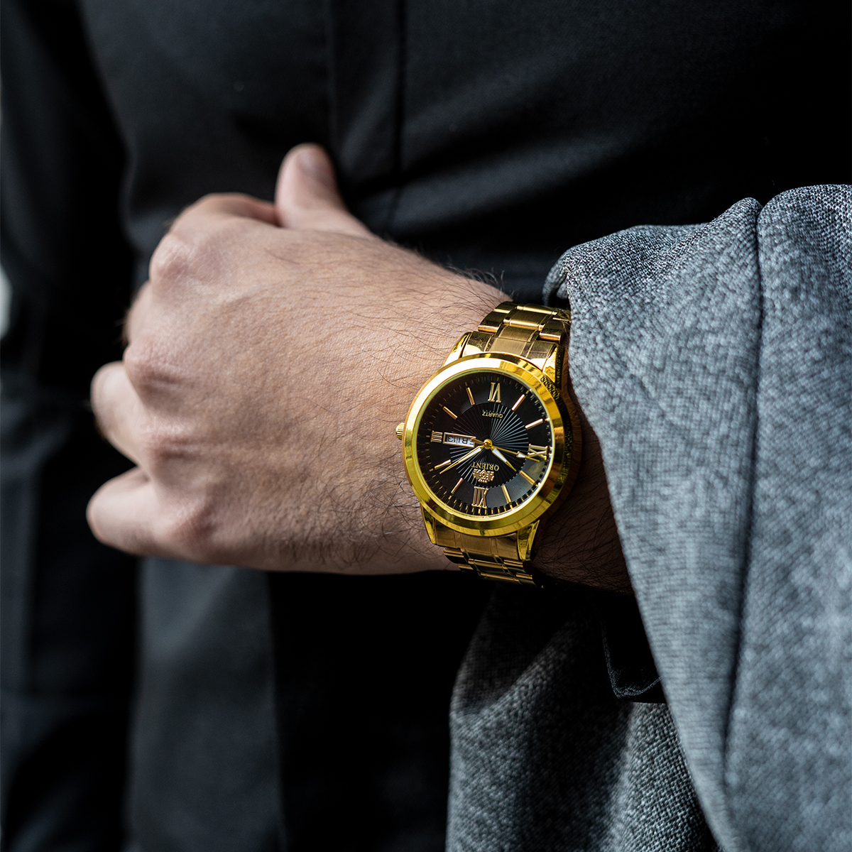 ساعت مچی Orient طلایی صفحه مشکی مدل Z20