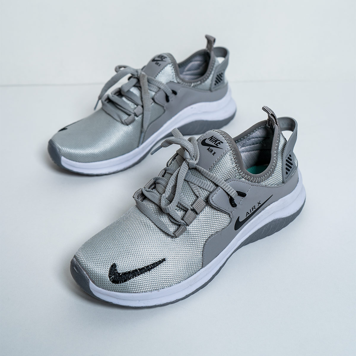 کفش ورزشی Nike دخترانه طوسی مدل Sarva