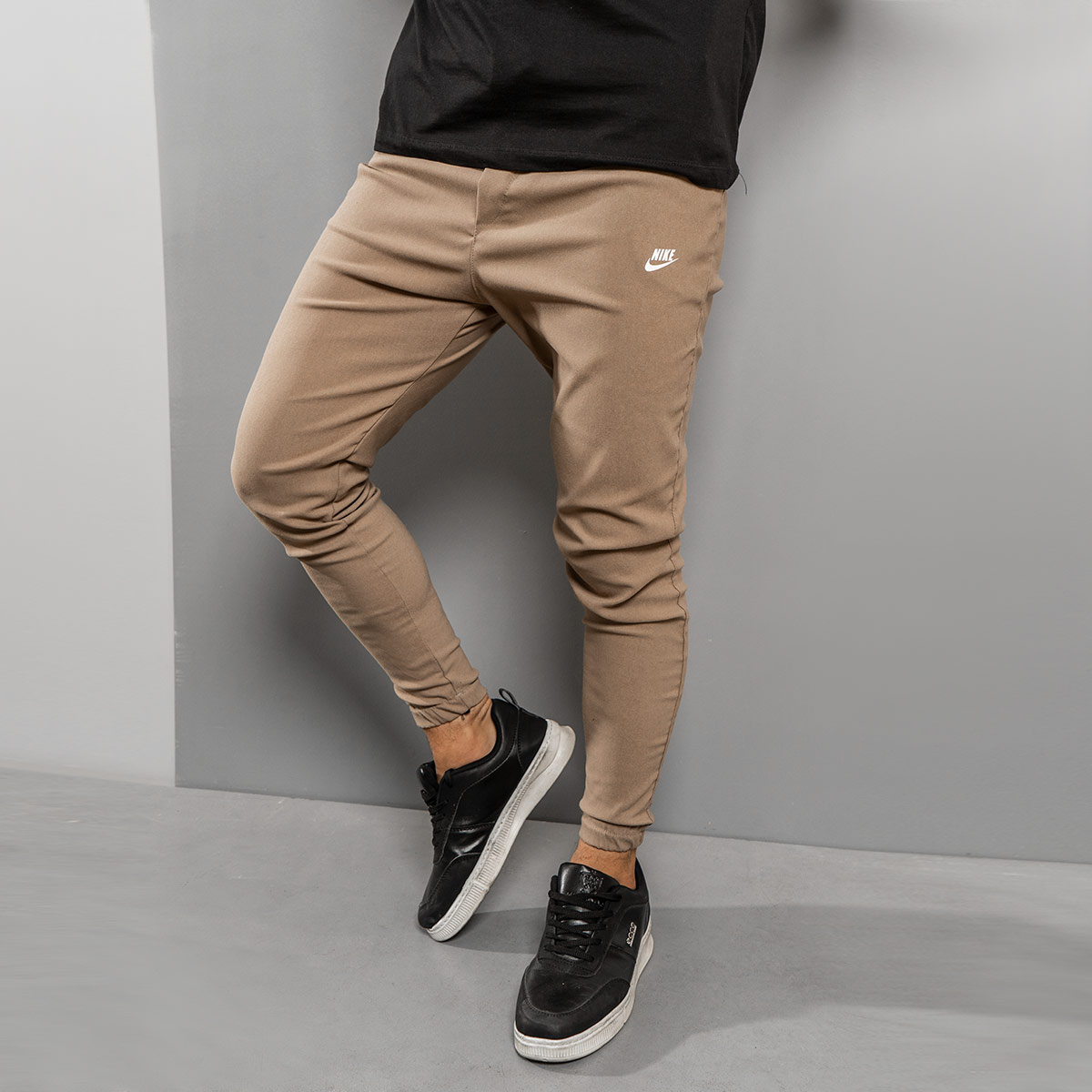 شلوار اسلش Nike کرم مردانه مدلLango